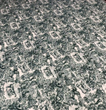 Close-up of Lion Design Upholstery Fabric with intricate black and white lion motifs on textured background for stylish home decor