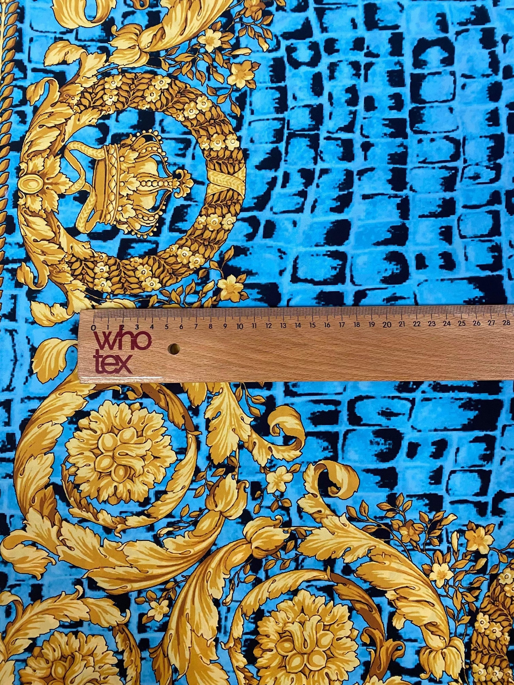 Turquoise snake skin fabric with gold baroque pattern and 150cm width measurement