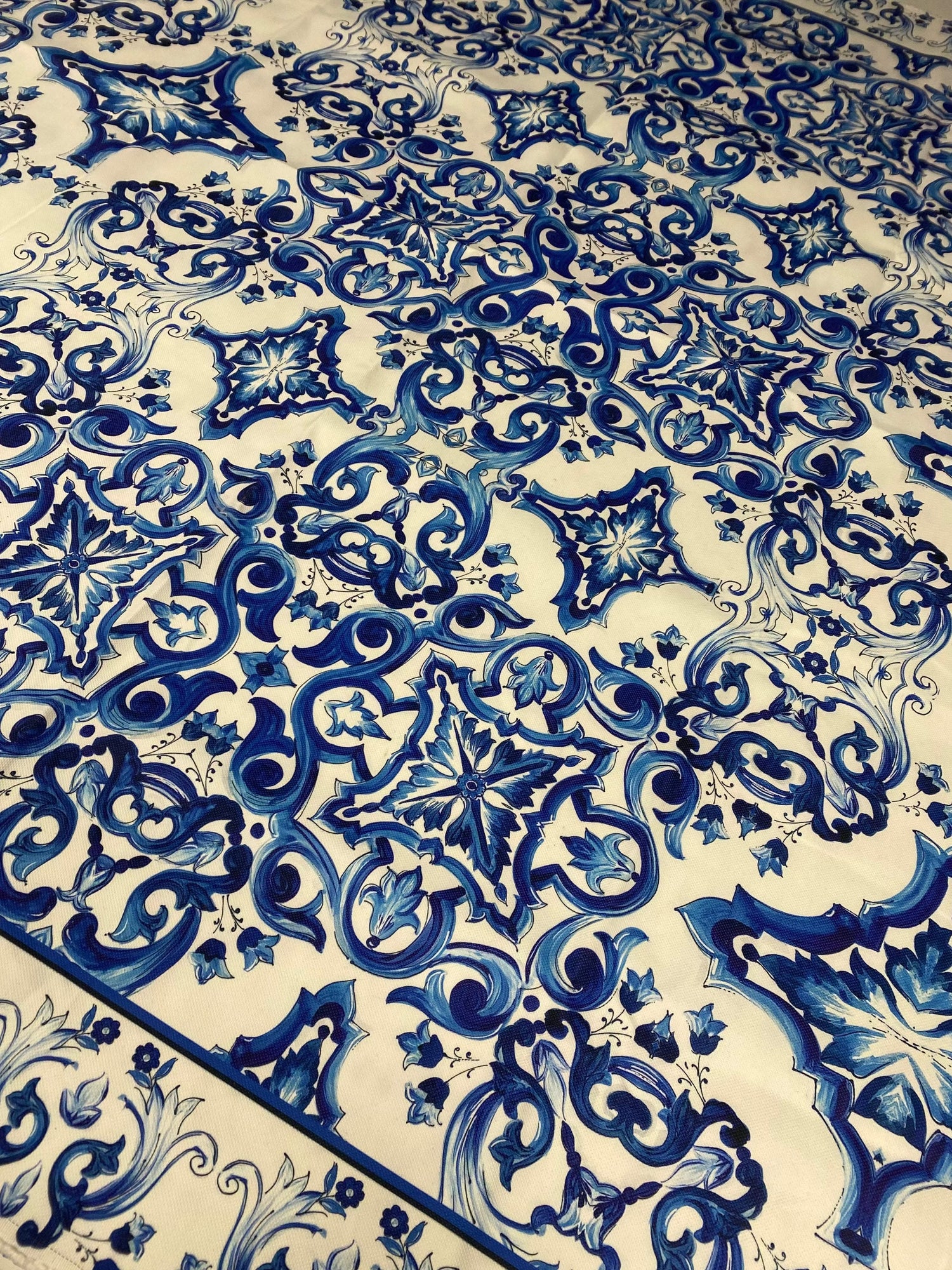 Mojalica Design Upholstery Fabric with intricate blue and white floral patterns, durable polyester material for home décor upholstery projects