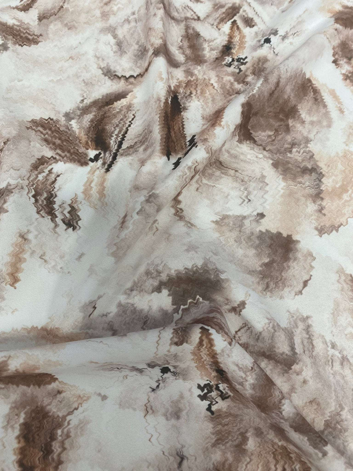Abstract brown floral fabric with soft texture and warm tones for sewing projects