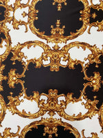 Baroque patterned fabric with black, white, and gold ornate design for elegant crafts