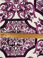 Baroque style purple ornamental print fabric with intricate design and ruler for scale