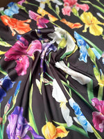 Multicolor floral pattern fabric with large vibrant flowers on black background, 150cm wide