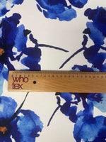 Bold Blue Watercolor Floral Fabric with vibrant blue floral watercolor design and wooden ruler for scale