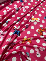 Pink fabric with white polka dots and colorful butterfly and ladybug patterns butterfly polka dot fabric