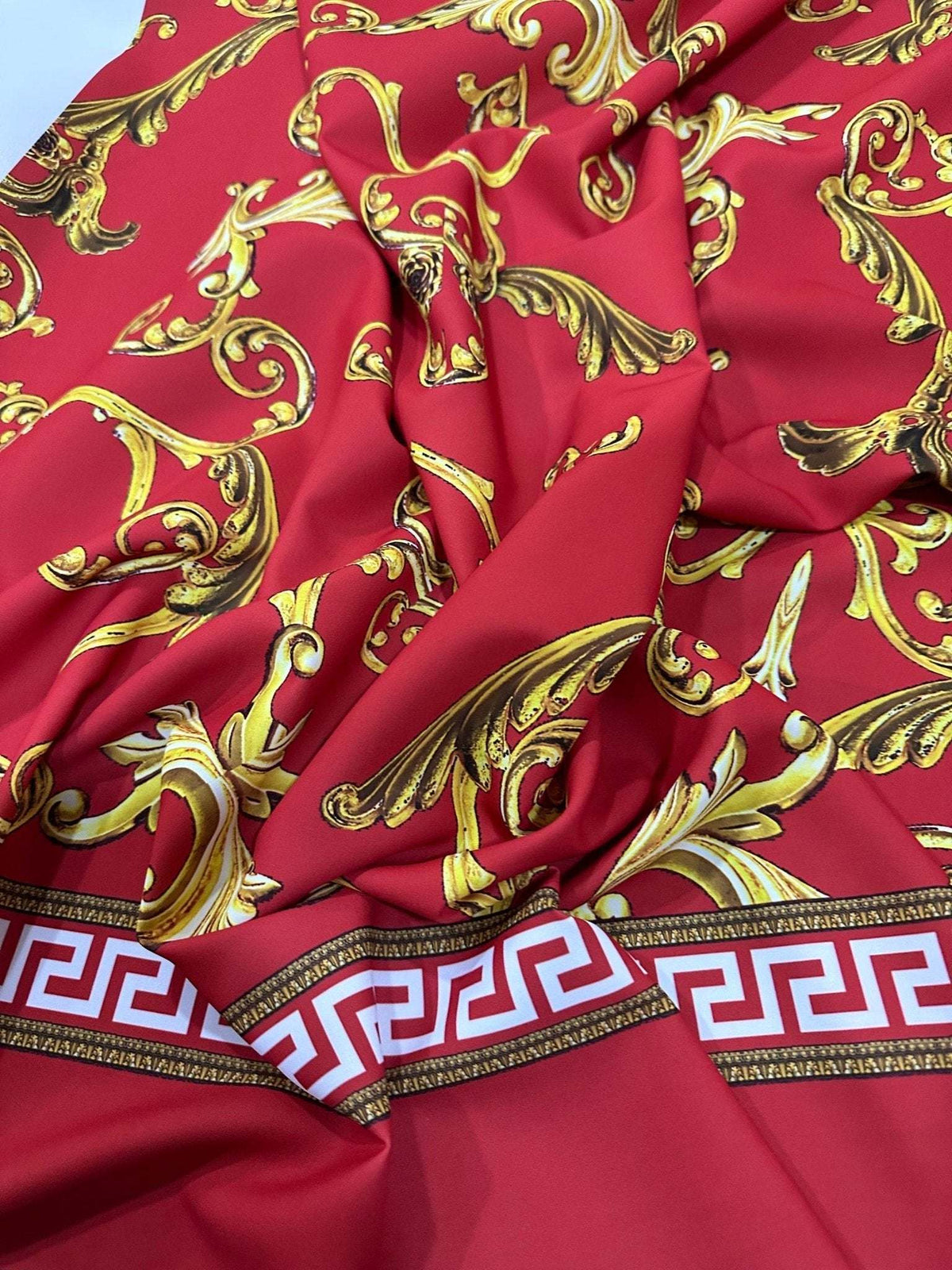 Greek Key Red Fabric with intricate gold Baroque pattern and decorative border, fabric width 150cm, vibrant and elegant textile for sewing and upholstery projects