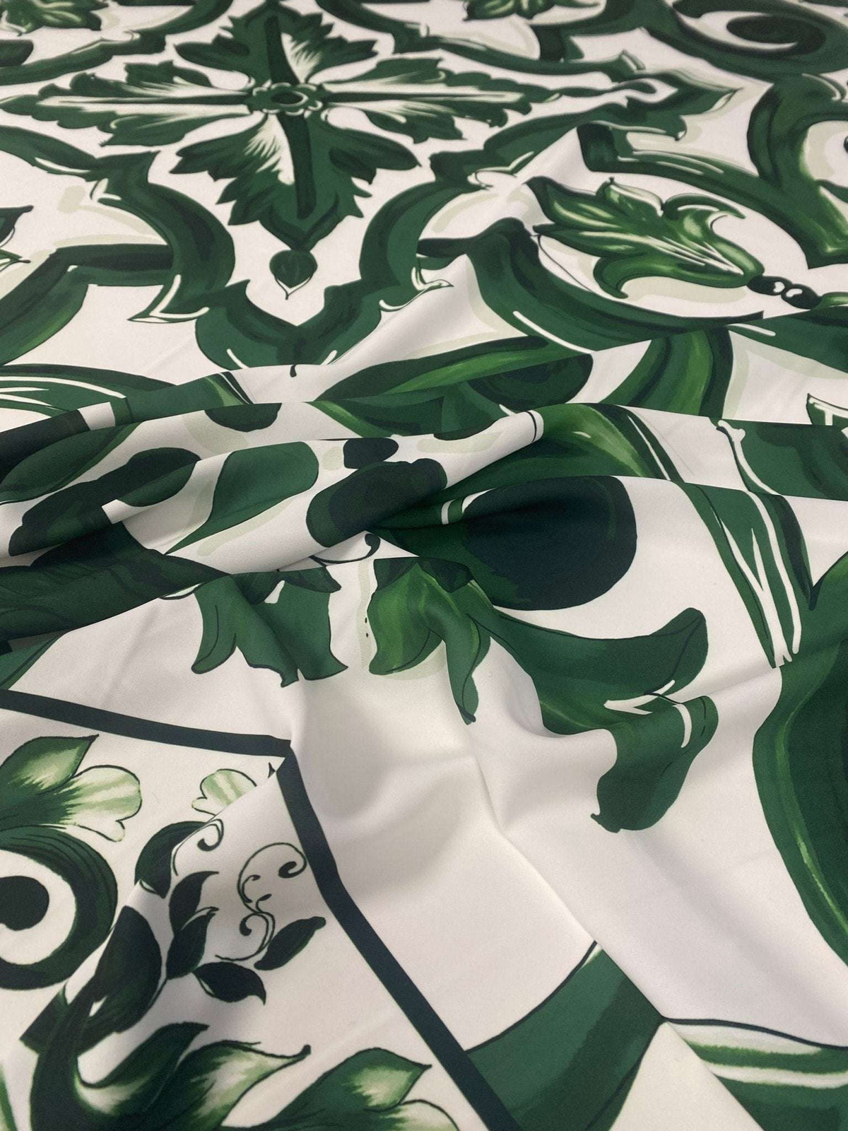Green Baroque Floral Fabric with elegant green floral and baroque patterns on white background, ideal for upholstery and curtains