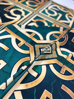 green gold crepe silky fabric with Greek key pattern and smooth texture