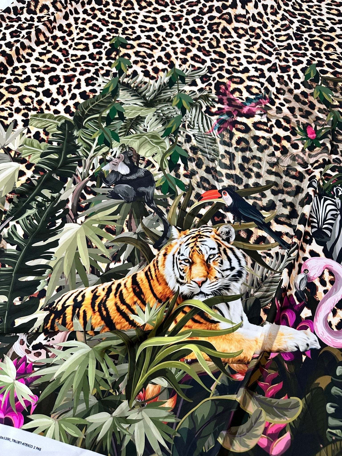 Leopard tropical leaf pattern fabric with jungle animals and leopard print background