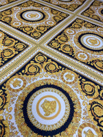 Luxurious Baroque Medusa black and gold fabric with intricate ornate pattern for upholstery and fashion