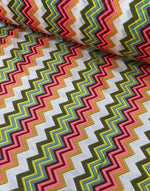 Multicolor zigzag knit jersey mesh fabric with vibrant zigzag pattern for crafting and apparel projects