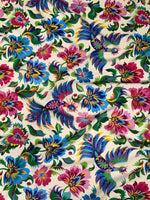 Colorful Otomi Bird Fabric with vibrant Mexican floral and bird patterns on cream background