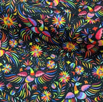 Black Otomi pattern upholstery fabric with colorful birds and floral designs