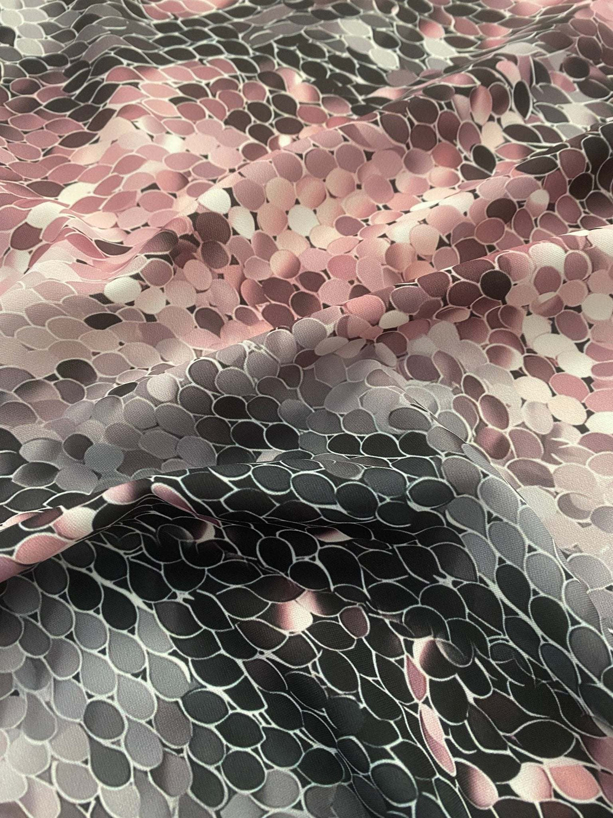 Pink and black abstract scales print fabric with textured optical illusion pattern, 150cm wide textile for fashion and decor projects