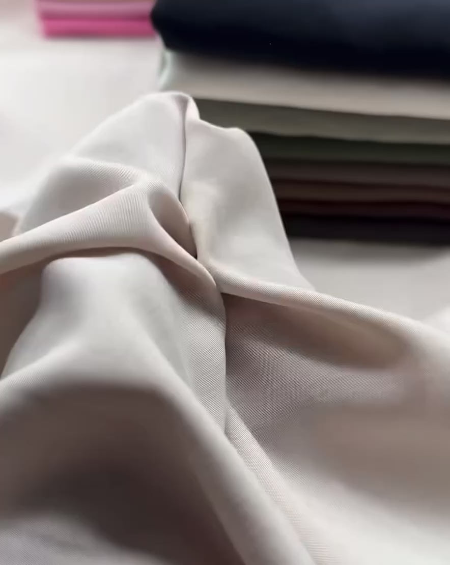 Modal Cupro Fabric by the Metre – Silk-Touch Floss Finish with Elegant Drape displayed in soft folds.