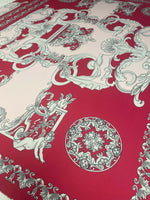 Pink vintage baroque cherub pattern fabric with intricate ornate designs