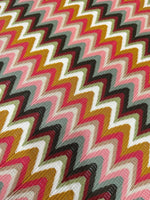 Luxury autumn chevron zigzag knit jersey fabric in warm fall colors with a bold pattern